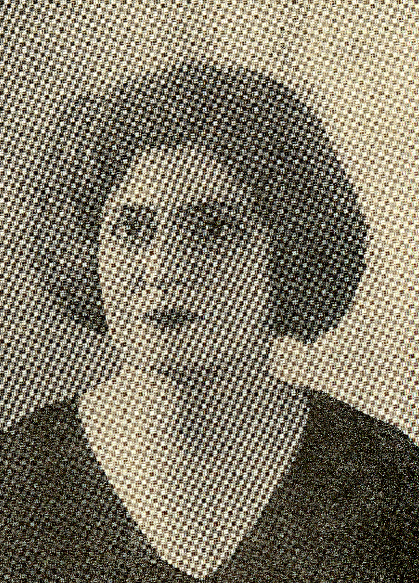 Retrato de mujer mirando hacia la izquierda.